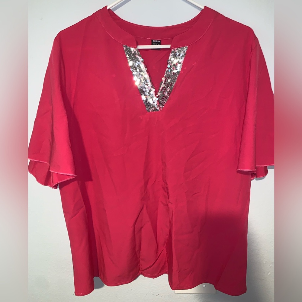 Pink blouse with sequent V-nevk